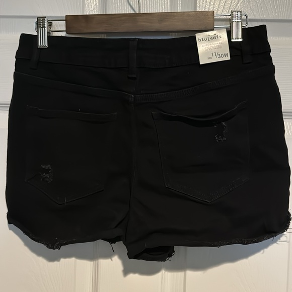 Distressed denim shorts - Picture 2 of 2